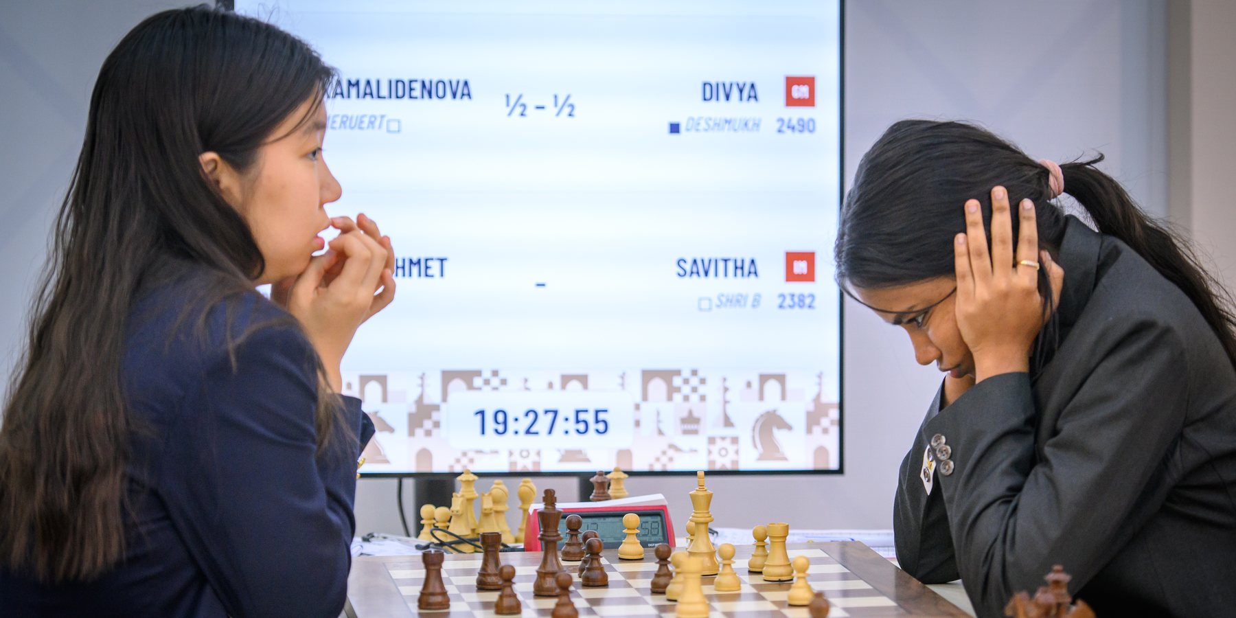 Savitha Shri (right) against Elnaz Kaliakhmet in round 8, still playing while the rest of the games have finished. Photo: Michal Walusza / FIDE